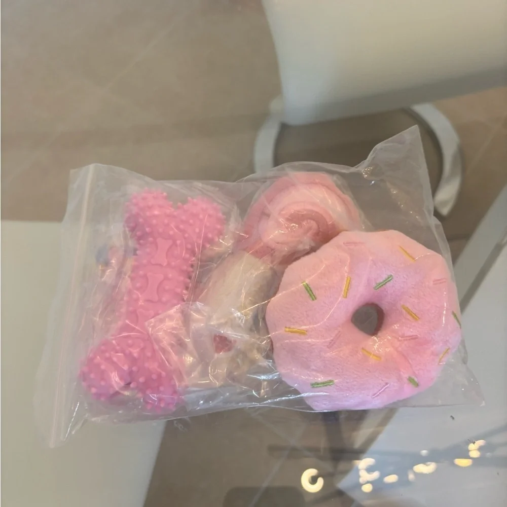 Pink Donut and Bone Toy Set Of 4 For Your Furry Legs . Brand New .
